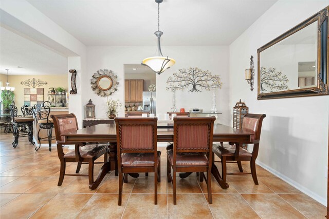 dining room featuring light tile patterned flooring