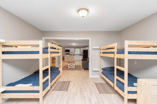 bedroom featuring hardwood / wood-style floors