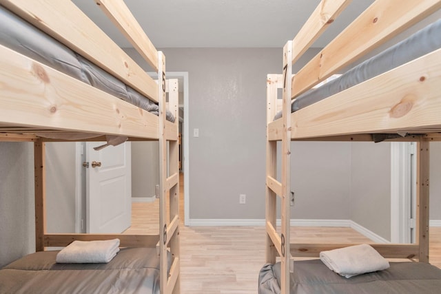 bedroom with light hardwood / wood-style floors