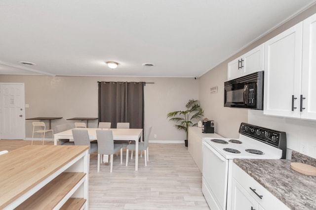 kitchen featuring light stone countertops, white range with electric cooktop, white cabinetry, and light hardwood / wood-style floors