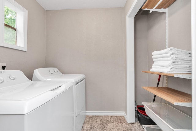 washroom with light carpet and washing machine and dryer