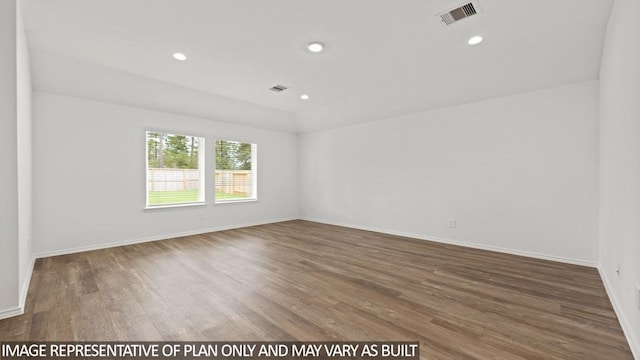 unfurnished room with dark hardwood / wood-style floors