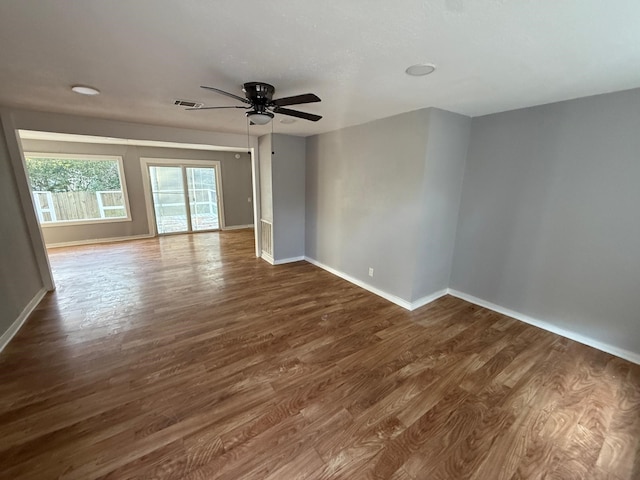 spare room featuring ceiling fan and hardwood / wood-style flooring