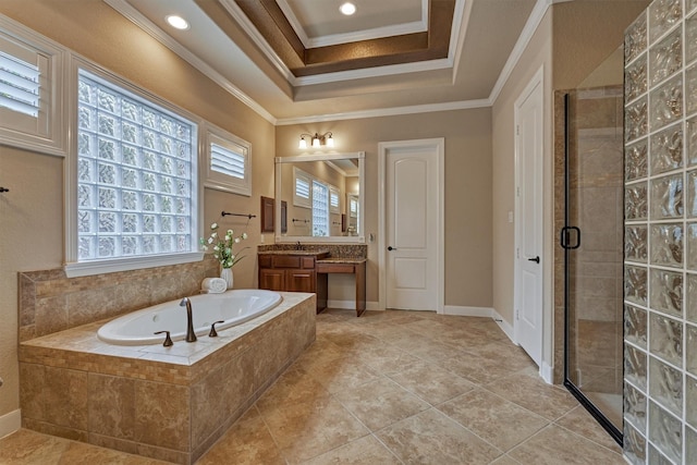 bathroom featuring vanity, tile patterned flooring, separate shower and tub, ornamental molding, and a tray ceiling