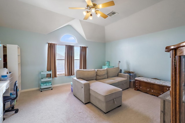 carpeted bedroom with ceiling fan and vaulted ceiling