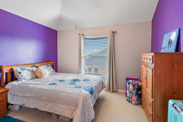 bedroom with light colored carpet