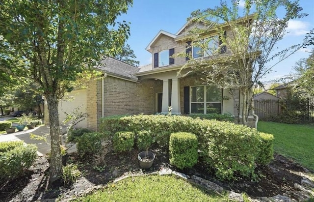 view of front of home with a front lawn