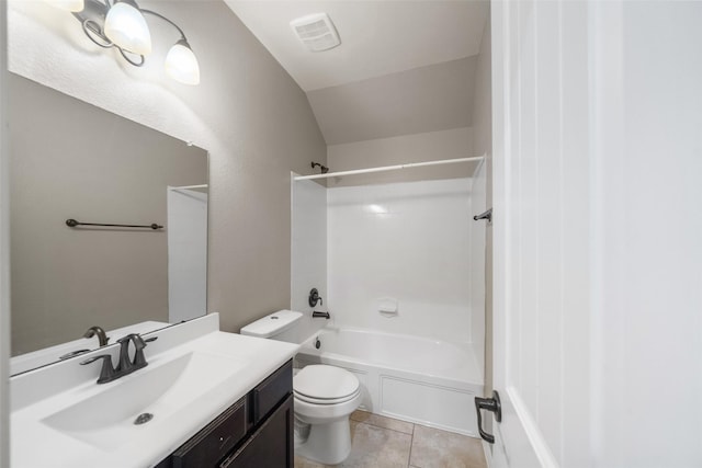 full bathroom with shower / bathing tub combination, vanity, lofted ceiling, tile patterned flooring, and toilet