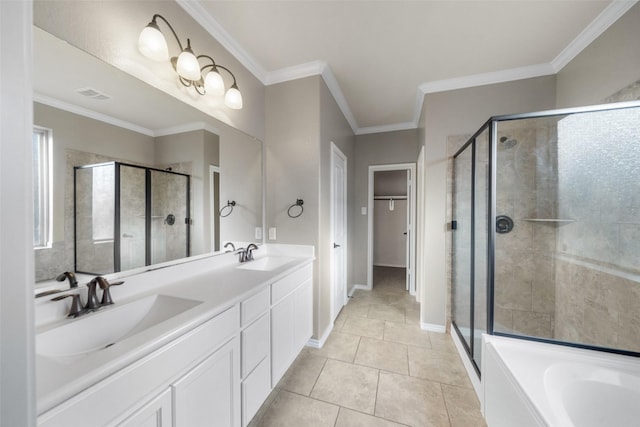 bathroom featuring tile patterned floors, crown molding, vanity, and shower with separate bathtub