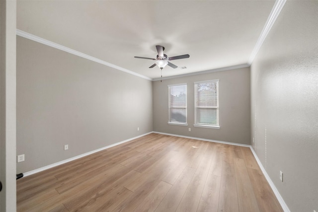 unfurnished room with ceiling fan, light hardwood / wood-style floors, and crown molding