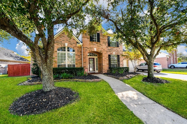 view of front property featuring a front lawn