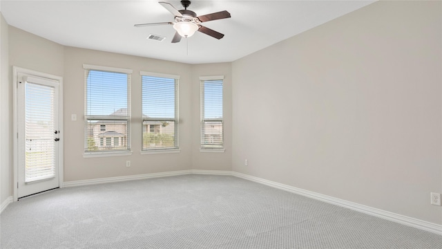 carpeted empty room with ceiling fan