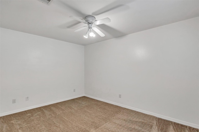 unfurnished room with carpet and ceiling fan