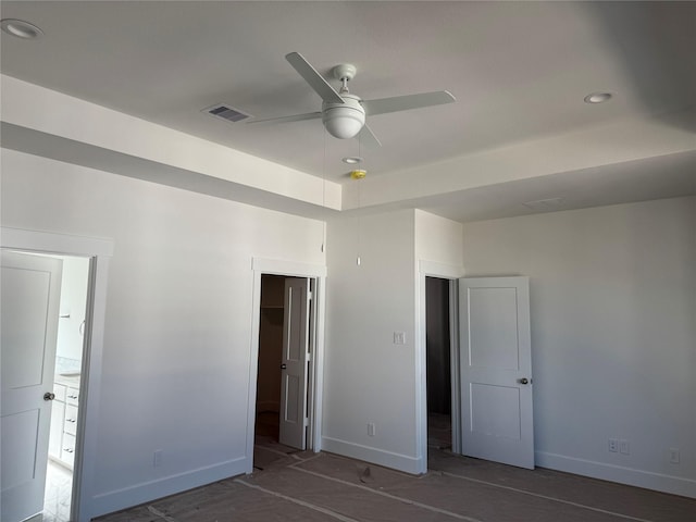 unfurnished bedroom featuring ceiling fan