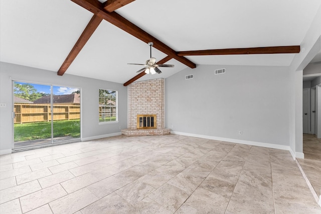 unfurnished living room with a brick fireplace, visible vents, vaulted ceiling with beams, and baseboards