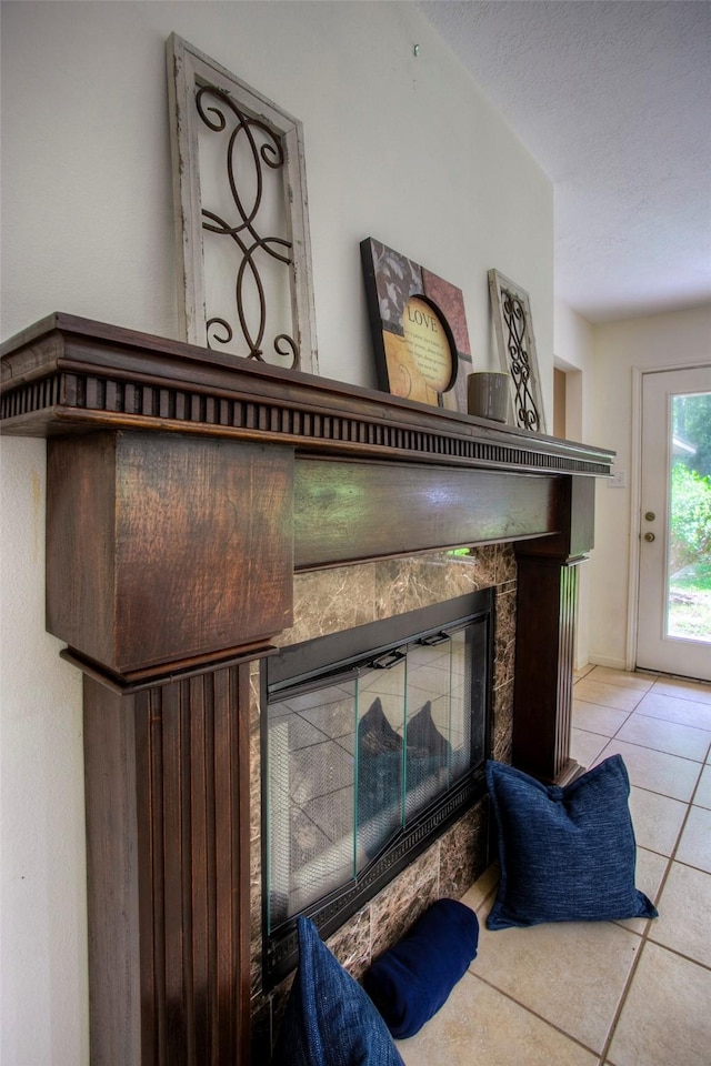 interior details featuring a high end fireplace