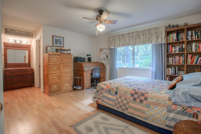 bedroom with light wood-style floors and ceiling fan