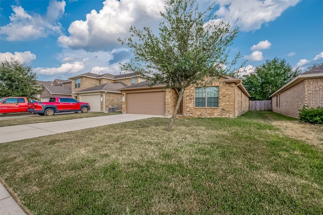 view of front facade featuring a front lawn and a garage