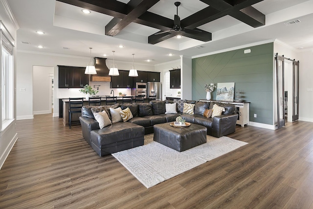 living room featuring beamed ceiling, ceiling fan, dark wood-type flooring, and coffered ceiling