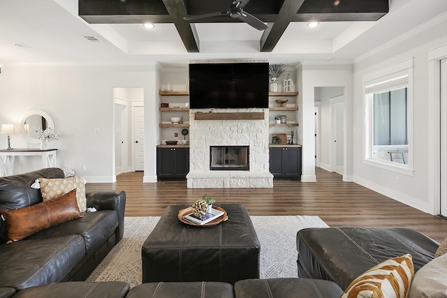 living room with a fireplace, dark hardwood / wood-style flooring, beamed ceiling, and coffered ceiling