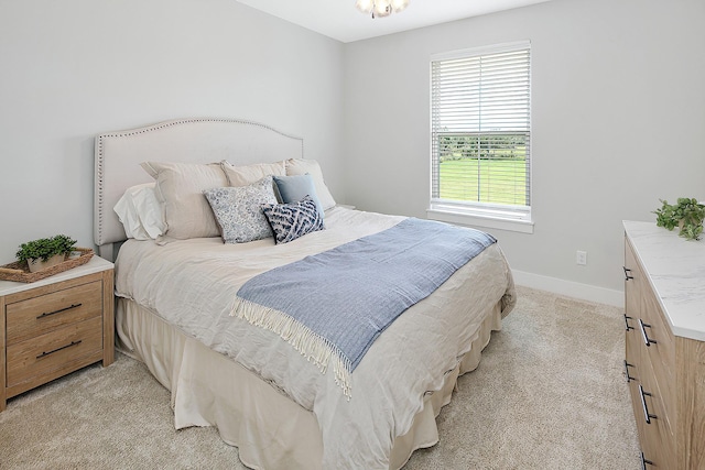 bedroom with light carpet