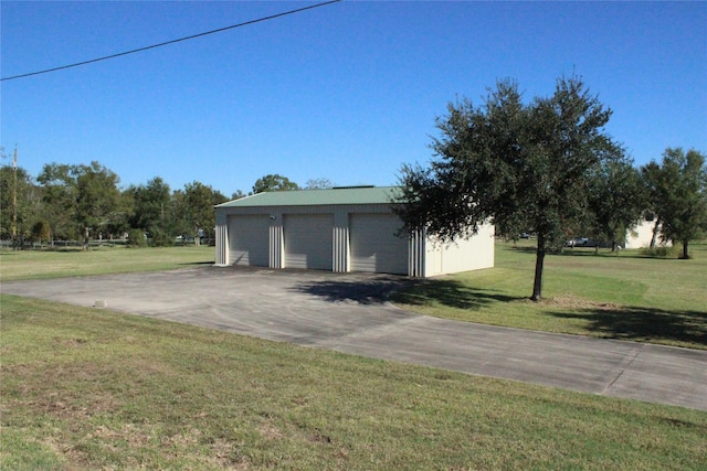 garage with a yard