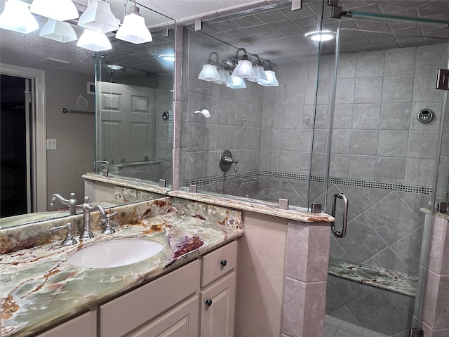 bathroom featuring vanity and walk in shower