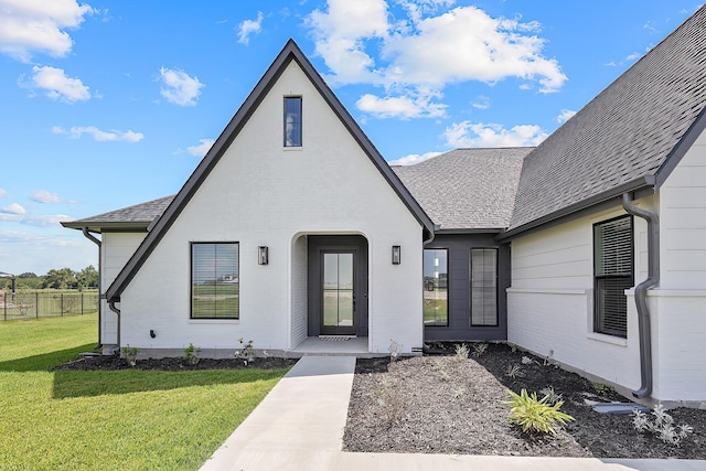 exterior space with a front yard