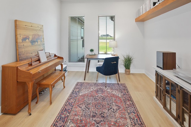 office space with light hardwood / wood-style floors