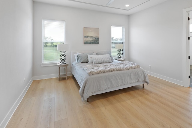 bedroom with light hardwood / wood-style floors