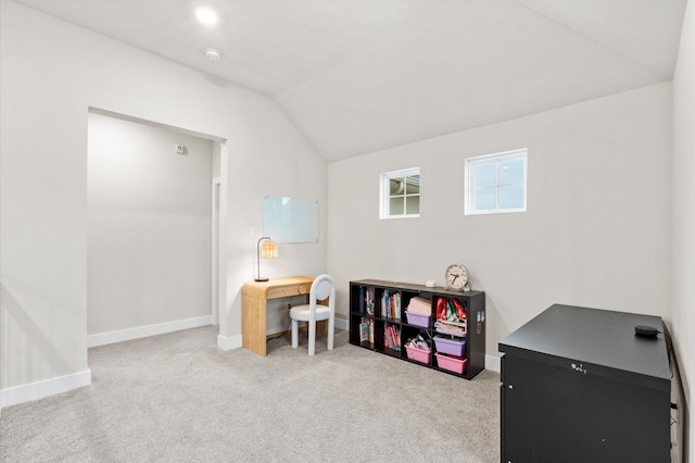 recreation room featuring carpet floors, vaulted ceiling, and baseboards