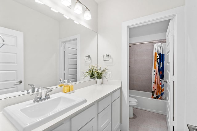 bathroom with toilet, shower / tub combo, and vanity