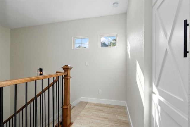 stairway featuring hardwood / wood-style floors