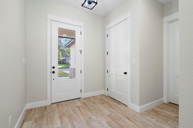 entrance foyer featuring light wood-type flooring