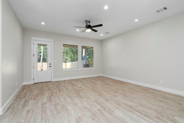 unfurnished room with light hardwood / wood-style floors and ceiling fan