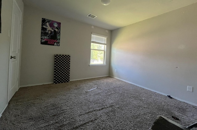 spare room featuring carpet flooring