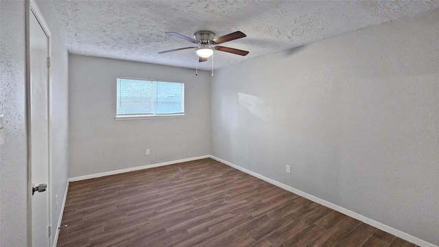 unfurnished room with a textured ceiling, dark hardwood / wood-style flooring, and ceiling fan