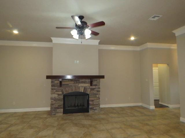 unfurnished living room featuring ceiling fan, a stone fireplace, and ornamental molding