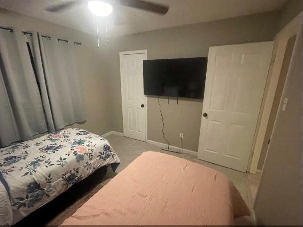 bedroom featuring ceiling fan