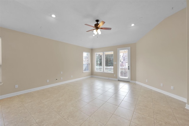 tiled empty room with ceiling fan