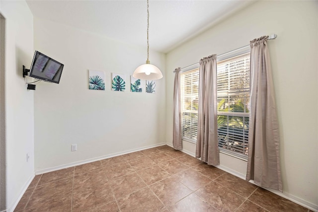 spare room with tile patterned floors