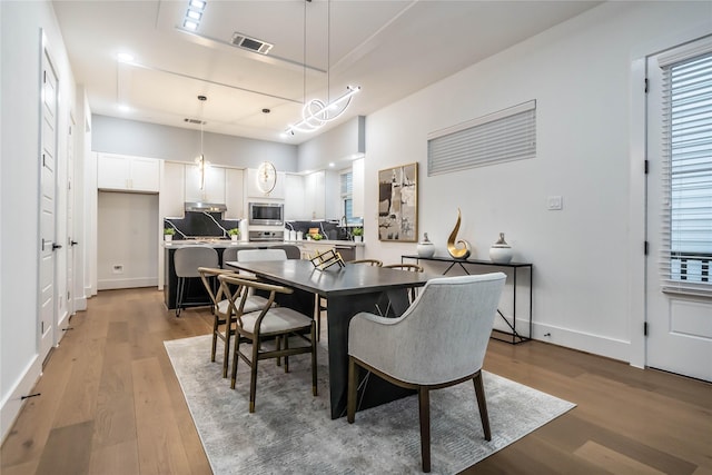 dining room featuring hardwood / wood-style floors