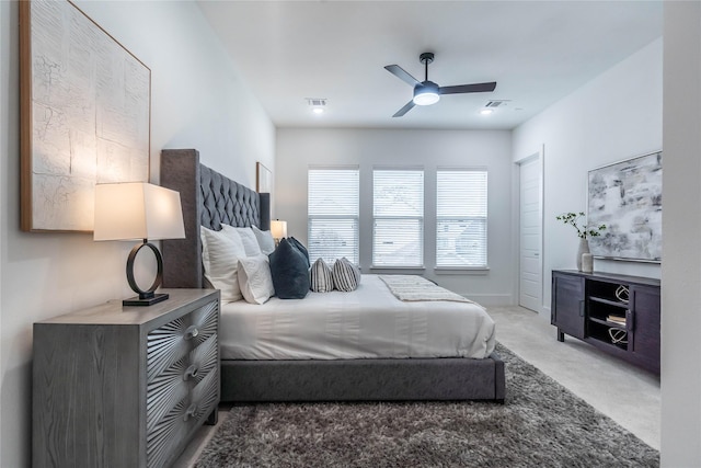 carpeted bedroom featuring ceiling fan