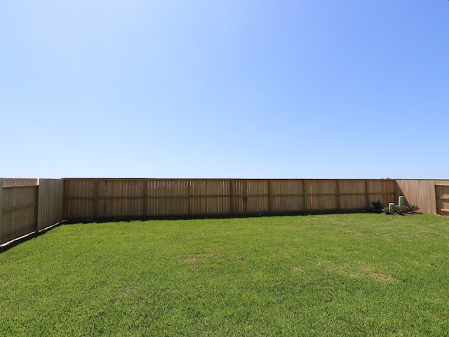 8327 Oceanmist Cove Dr, Cypress, TX 77433 - view of yard featuring a fenced backyard