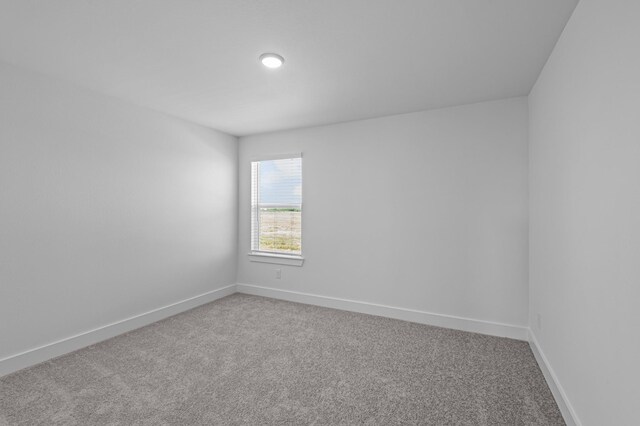 8327 Oceanmist Cove Dr, Cypress, TX 77433 - carpeted empty room with baseboards