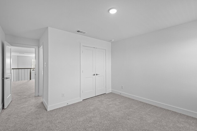 8327 Oceanmist Cove Dr, Cypress, TX 77433 - unfurnished bedroom with carpet floors, baseboards, and a closet
