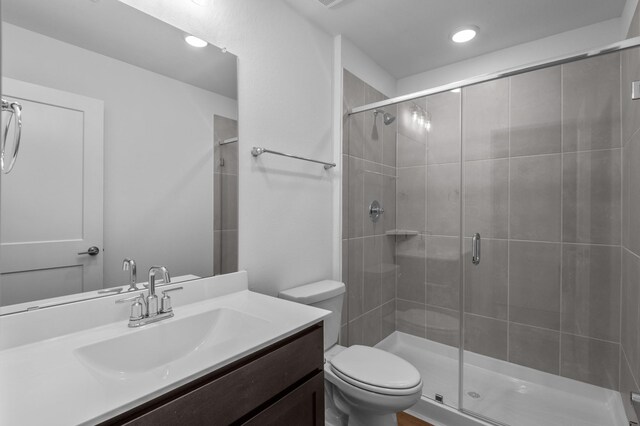 8327 Oceanmist Cove Dr, Cypress, TX 77433 - full bath featuring a shower stall, toilet, vanity, and recessed lighting