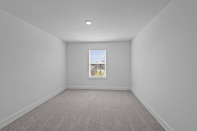 8327 Oceanmist Cove Dr, Cypress, TX 77433 - empty room featuring light carpet and baseboards