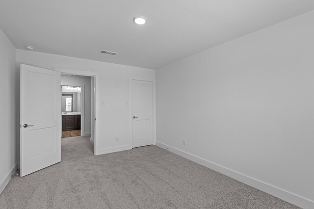 8327 Oceanmist Cove Dr, Cypress, TX 77433 - unfurnished bedroom featuring baseboards and carpet