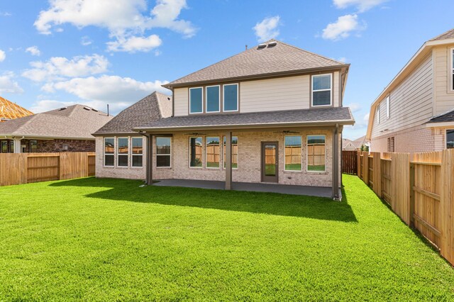 8327 Oceanmist Cove Dr, Cypress, TX 77433 - back of house with a shingled roof and a patio
